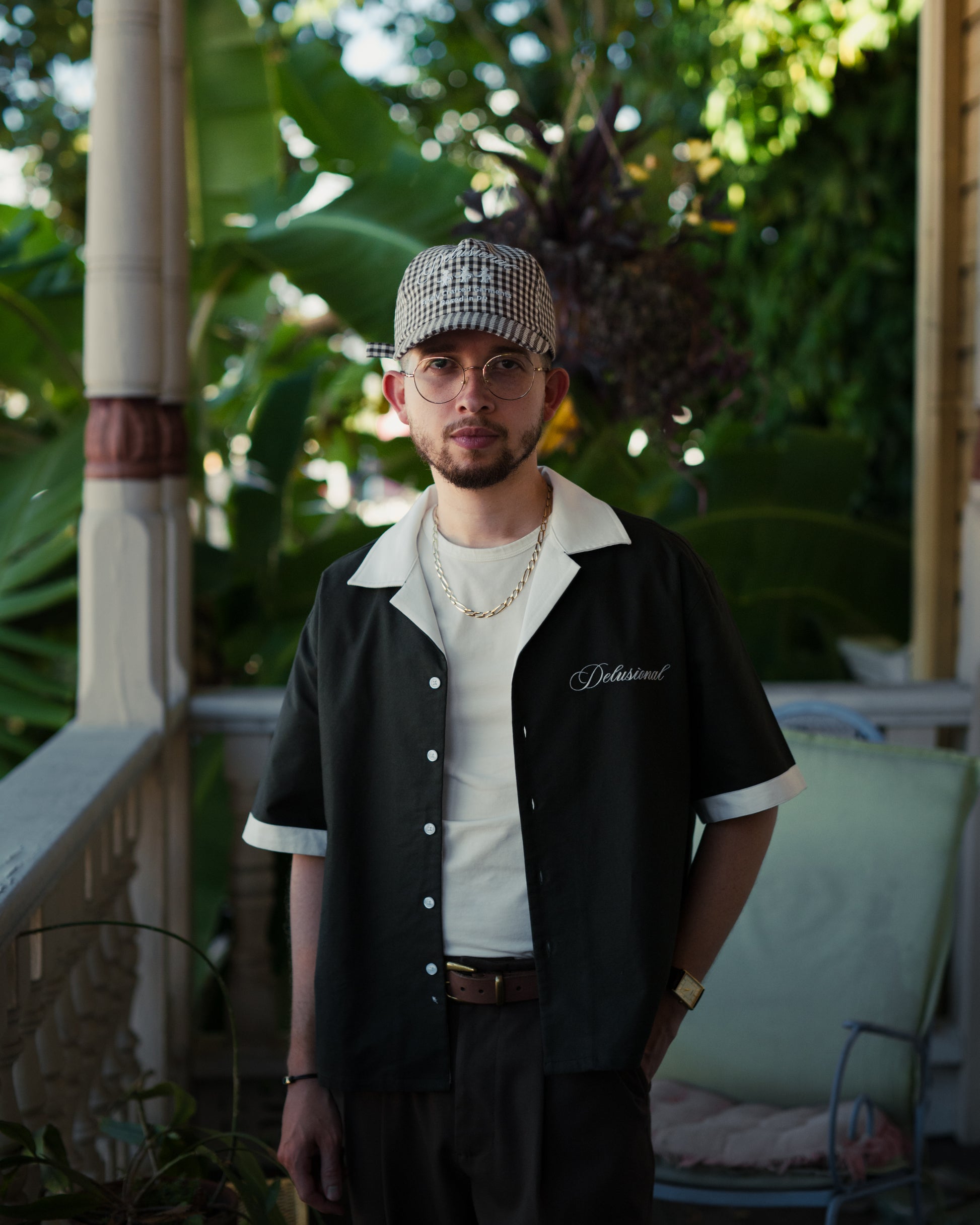 Model wearing Designed in PR button-up shirt in Puerto Rico