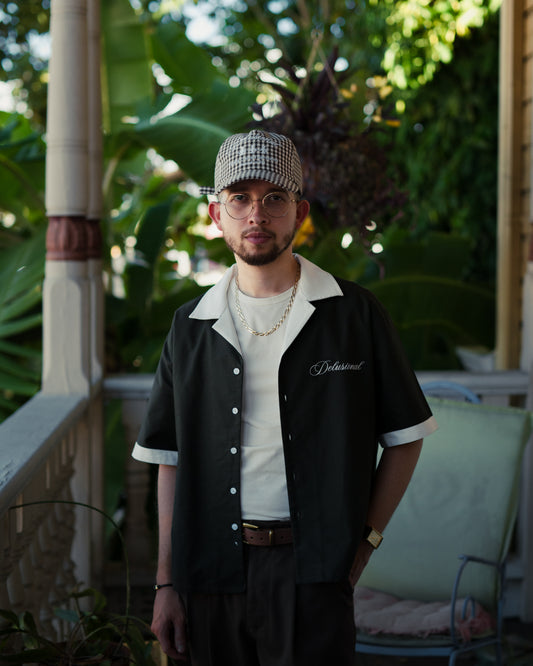 Model wearing Designed in PR button-up shirt in Puerto Rico