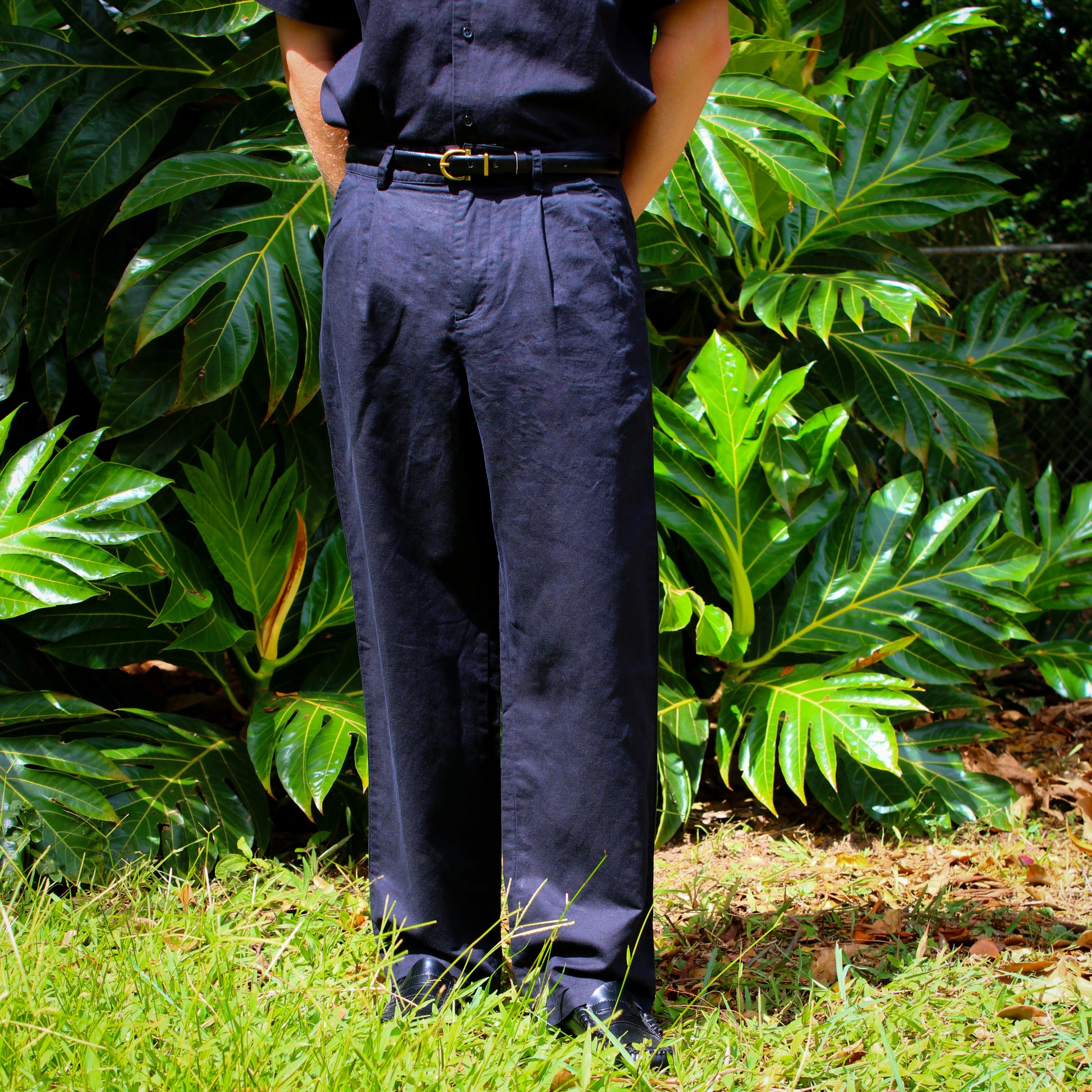 Model wearing men's linen trousers in a smart casual outfit