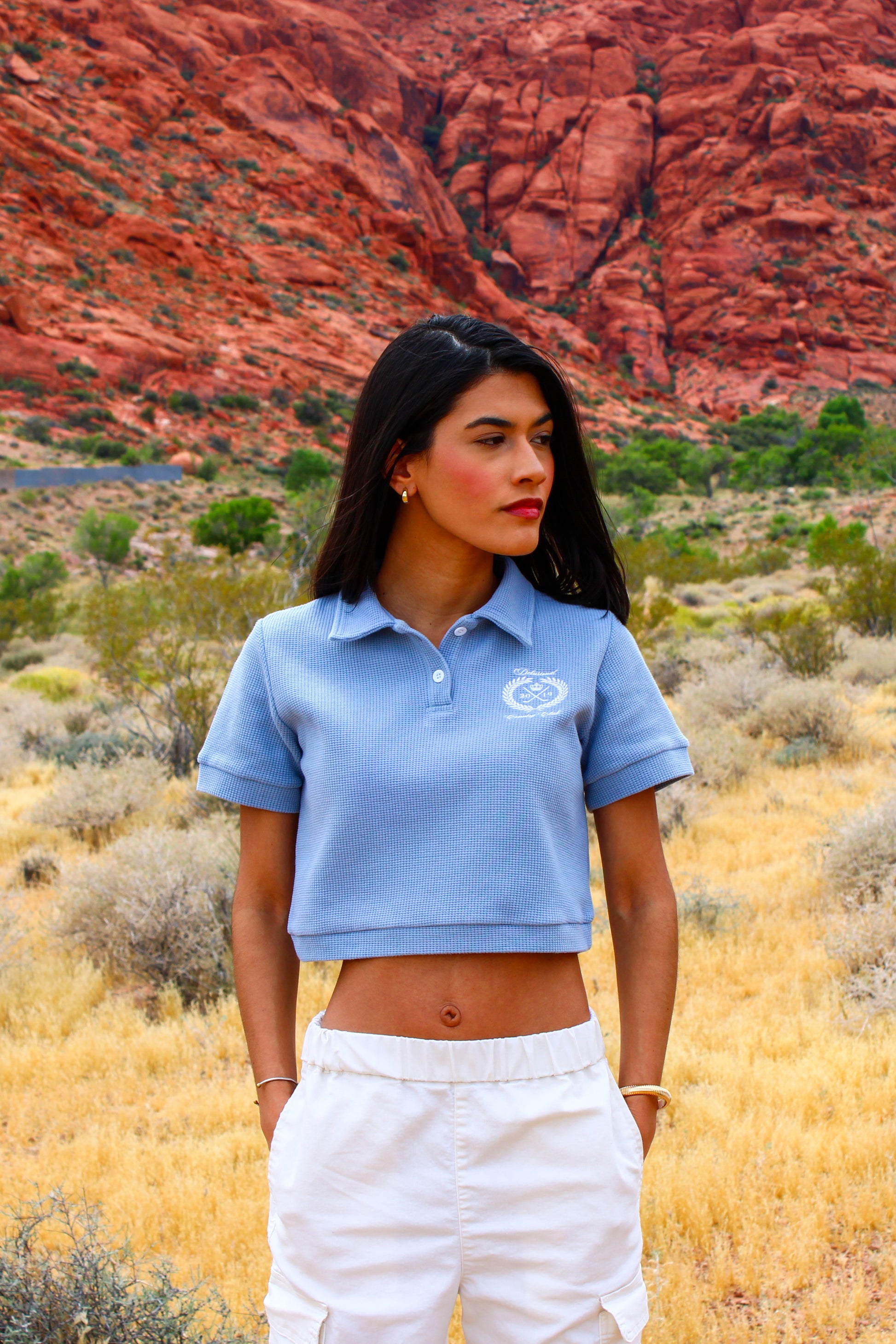 Model wearing sky blue waffle cotton polo shirt